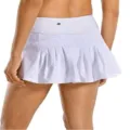 High-waisted pleated athletic sports skort for women with built-in shorts and secure pockets. - XS / White