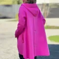 Women's bright pink hooded woolen coat with stylish back ring straps and pockets. - Rose Red
