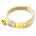 Adjustable yellow pet collar featuring white paw print design, buckle and cute bell. - Khaki