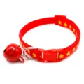 Red pet collar with yellow stars, featuring a metal bell and buckle for small cats and dogs detail view. - Width 1.0cm, Adjustable Range 21-34cm / Red
