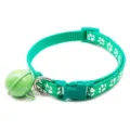 Green paw print pet collar detail, featuring a cute bell, durable buckle and D-ring. - Green