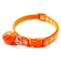 Orange pet collar with cute white paw print, durable buckle, and loud bell for cats and dogs. - Orange