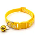 Yellow pet collar with cute white paw prints, metal D-ring and bell for cats and small dogs. - Yellow