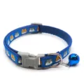 Blue cat collar detail close-up, woven nylon strap with cute cartoon cats and bell. - Blue