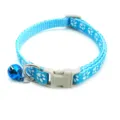 Blue nylon cat collar featuring cute white paw print patterns, a safe buckle, and a bell. - Lake Blue