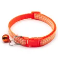 Orange plaid pet collar detail, fabric neck strap, plastic buckle, and bell decoration. - Orange