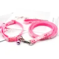 Pink pet collar and leash set with cute paw print pattern for small dogs and cats detail view. - Pink