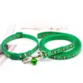 Detail view of green pet leash and collar set with cute cartoon animals and metal bell. - Green