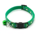 Close-up detail of the green pet cat collar with cute heart patterns and a small bell. - Green