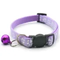 Detail view of adjustable purple pet collar with white paw prints and metal bell. - Light Purple