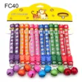 Colorful pet collars set with cute bells and cartoon prints, durable plastic buckle, 12pcs. - Width 1.0cm / FC40