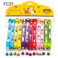 Colorful patterned pet cat dog collar with bell and quick release buckle on backing card. - FC37