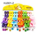 Colorful pet collar detail showing fabric bowknot and cute metal bell on card packaging. - HJ001-2