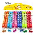 Colorful pet collar detail featuring cute animal patterns, durable fabric and small bell. - FC20