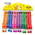 Colorful pet collar detail showing cute puppy print, durable nylon strap, and a jingle bell. - FC38