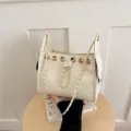 Chic white quilted bucket bag for women, leather woven chain shoulder handbag, versatile daily use. - White