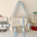 Cute Japanese college style canvas crossbody messenger bag with clear pocket and blue straps. - Blue and White