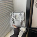 Petit sac à dos argenté pour femme, sac de voyage casual en cuir PU effet métallique. - Avec Pendentif / Argent