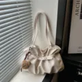 Cream pleated shoulder bag with cute bear charm, elegant commuter tote for women. - With Pendant / White