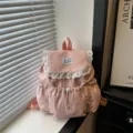 Sac à dos rose imprimé d'étoiles avec bordure en dentelle mignonne et cordon de serrage. - Rose