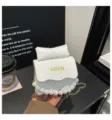 Lindo bolso bandolera infantil con asa de perlas y lazo blanco bolso de moda para niñas - Blanco