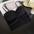 Detail view of black seamless ice silk camisole with built-in chest pad and ruched front design. - One Size / Tops / Black