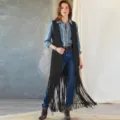 Detailed view of the stylish women's long fringe vest in a chic ethnic design with movement. - S / Tops / Black