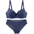 Dark blue seamless bra and panties detail view, smooth fabric with cute bow accent. - Dark Blue