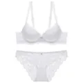 Detailed view of a white lace bra and panties set featuring floral lace and push-up design. - 70A / Top And Bottom / White