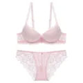 Pink lace bra set detail view, exquisite floral pattern, elegant intimate apparel close-up. - 70A / Top And Bottom / Pink