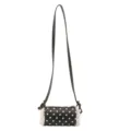 Bolso de hombro cilíndrico con lunares en blanco y negro para mujer con detalles de encaje. - Negro