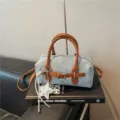 Denim boston handbag with brown leather handles, casual chic pillow shoulder bag for women detail - With Pendant / Brown