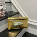 Elegant gold metallic crocodile pattern clutch bag for women, stylish minimalist envelope purse. - Gold