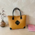 Κίτρινη πλεκτή τσάντα tote με μαύρες λαβές και κομψό σχέδιο τριφυλλιού για καθημερινή μόδα - Μαύρο