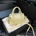 Bolso Boston amarillo elegante para mujer, bolso cruzado de cuero PU vintage con asa. - Amarillo