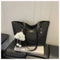 Black large capacity tote bag with cute plush cloud pendant, casual commuting style detail. - With Cloud Pendant / Black