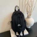 Black lightweight minimalist drawstring backpack casual versatile travel daypack waterproof daily bag - Black