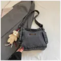 Dark grey washed denim shoulder bag with cute bear pendant, casual dumpling crossbody bag. - With Pendant / Sand Wash Black