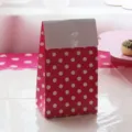 Pink polka dot paper gift bags for birthday party decorations and goody treats packaging. - Gift Box