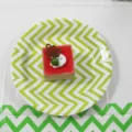 Green chevron disposable paper plate detail shot, perfect for kids birthday party and celebration. - Green Wave