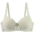 Seamless solid color padded bra detail showcasing smooth cups and adjustable wide straps. - 75B / Fruit Green