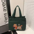 Dunkelgrüne Canvas-Tasche mit traditioneller chinesischer Stickerei für stilvolle Alltagsnutzung. - Stil 2 / Grün