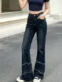 Dunkle Schlagjeans mit hoher Taille und ausgefransten Bündchen, modischer Streetstyle-Detailblick. - S(30) / Dunkelblau Denim