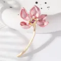 Exquisite pink enamel lotus brooch with gold stem, pearls and rhinestones for elegant styling. - Pink