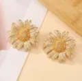 Chic gold sunflower earrings, textured metal floral stud earrings for summer beach holiday. - Sunflower Gold Earrings