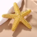 Exquisite gold starfish brooch, elegant alloy marine-themed apparel accessory pin. - Gold
