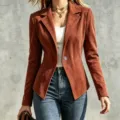 Detail view of the brown suede jacket, slim-fit lapel single-button design for women. - S / Tops / Orange Red