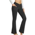 Close-up of black crossover high waist flare yoga pants with convenient side pocket detail. - Black