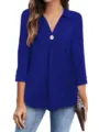 Detail view of the royal blue V-neck long sleeve blouse featuring single button and curve hem. - S / Tops / Blue