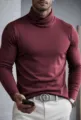 Detailed close-up of mens burgundy turtleneck long sleeve shirt with slim fit style. - S / Tops / High Neck / Burgundy